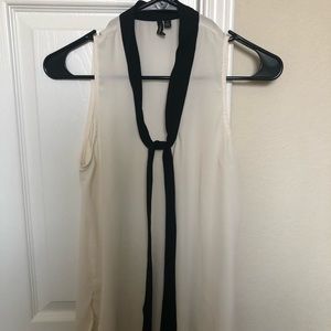 Cream colored blouse with front tie straps